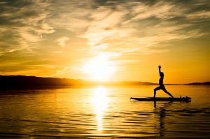 Stand up paddle board yoga